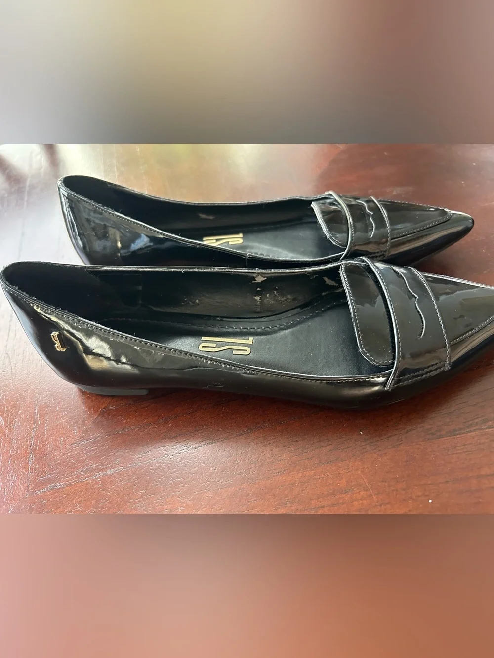 Pointed Toe Black Patent Loafer Flats size 8B It shows wear on the inside.